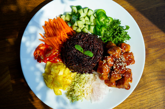 Khao yum Thai rainbow rice salad made with copra's organic coconut nectar and coconut aminos