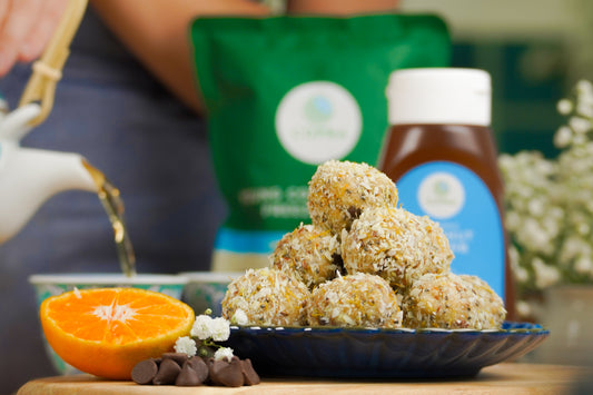 Orange and dark chocolate energy balls featuring Copra's organic coconut nectar