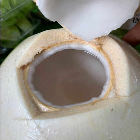 Organic young Thai nam hom coconuts