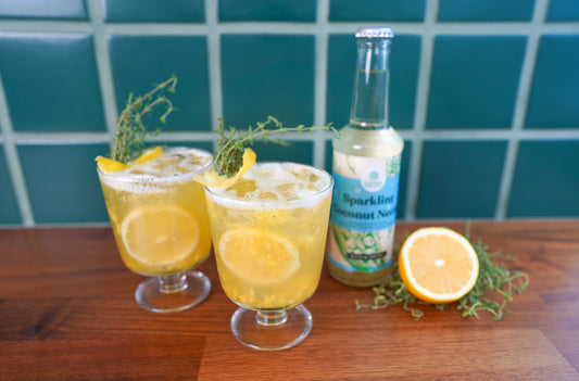 Pineapple and thyme happy gut cocktail made with Copra's Sparkling Coconut Nectar